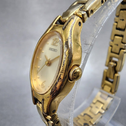 Seiko Watch Women 17mm Champagne Dial Gold Tone Oval 1N010CS0 New Battery2