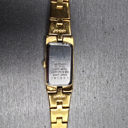 Seiko Tank Watch Women 13mm Gold Dial Gold Tone Rectangle 2E20-7479 New Battery510
