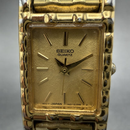Seiko Tank Watch Women 16mm Champagne Dial Gold Tone Rectangle 1N01-5A69 New Bat1