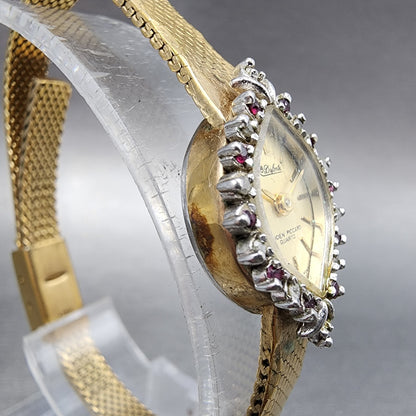 Lucien Piccard Dufonte Watch Women 14mm Champagne Dial Gold Tone Ruby Bezel Runs