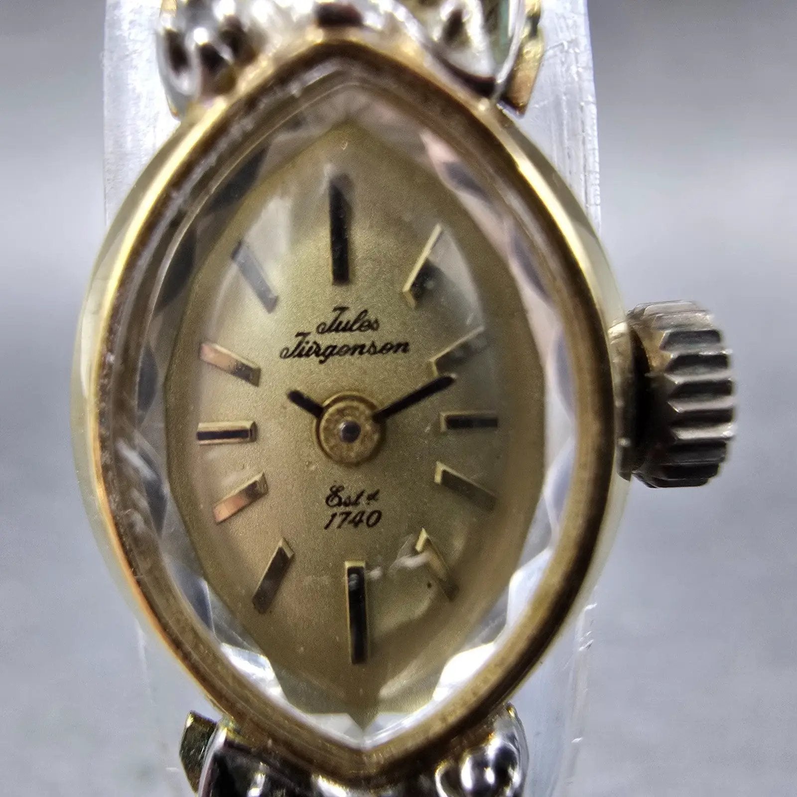 Jules Jurgenson Watch Women 14mm Champagne Dial Gold Oval Gem Set Bezel Manual1