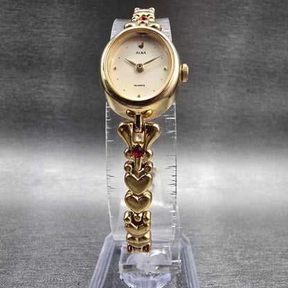 Seiko Alba Watch Women 17mm Cream Dial Gold Gems Oval V810-5020 New Battery5