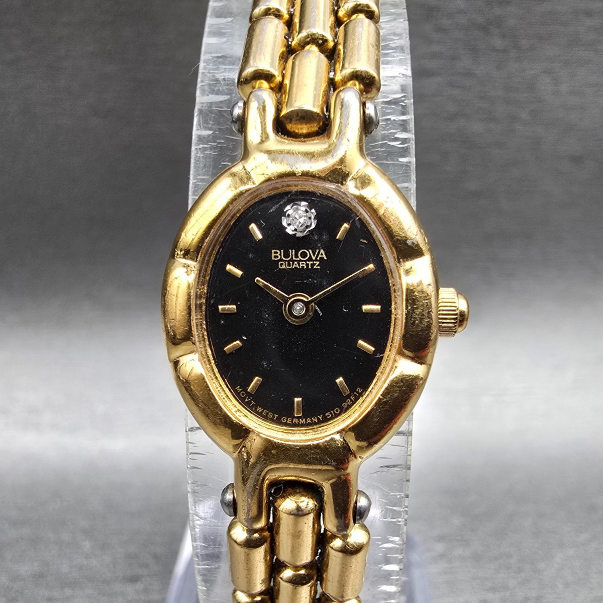 Bulova Watch Women 16mm Black Dial Gold Tone Oval 92F12 New Battery Diamonds VTG0