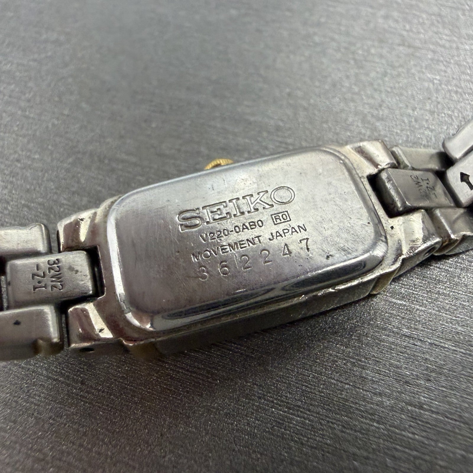 Seiko Tank Watch Women 13mm White Dial two Tone Rectangle V220-0ab0 New Batt OH79
