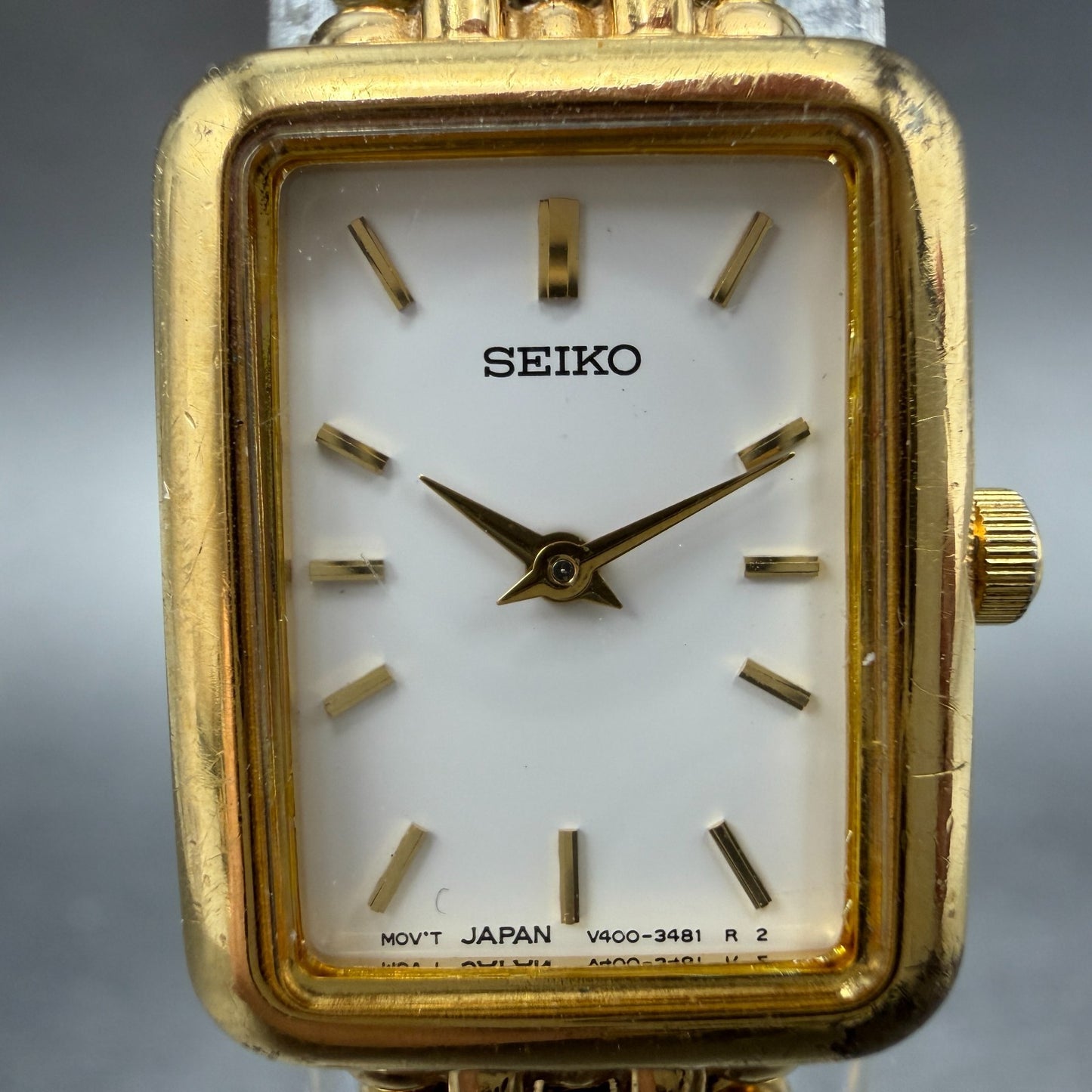 Seiko Tank Watch Women 17mm White Dial Gold Tone Rectangle V400-6169 New Battery1