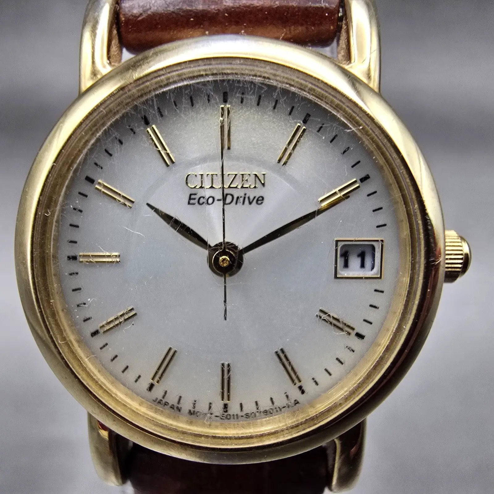 Citizen Eco-Drive Watch Women 23mm Silver Dial Gold Tone Date E011-S049423 Works1