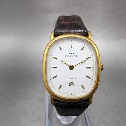 Technos Watch Women 23mm White Dial Gold Tone Date Oval 51178 New Battery0