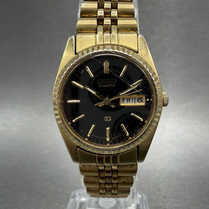 Seiko SQ Watch Women 24mm Black Dial Gold Tone Daydate 24mm Round New Battery NL0