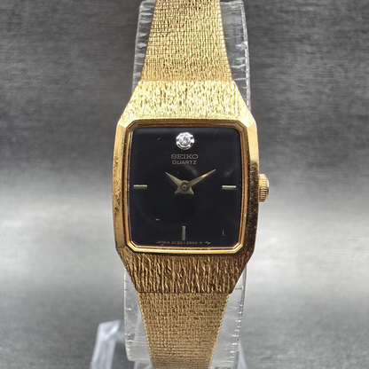 Seiko Womens Watch 17mm Black Dial Gold Tone Rectangle 2C20-6389 New Battery0