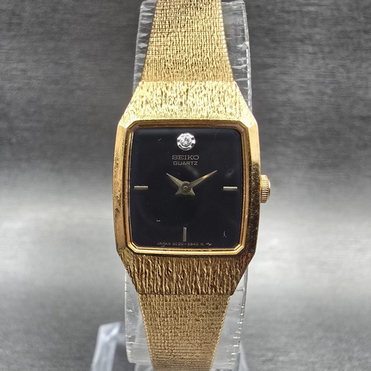 Seiko Womens Watch 17mm Black Dial Gold Tone Rectangle 2C20-6389 New Battery0