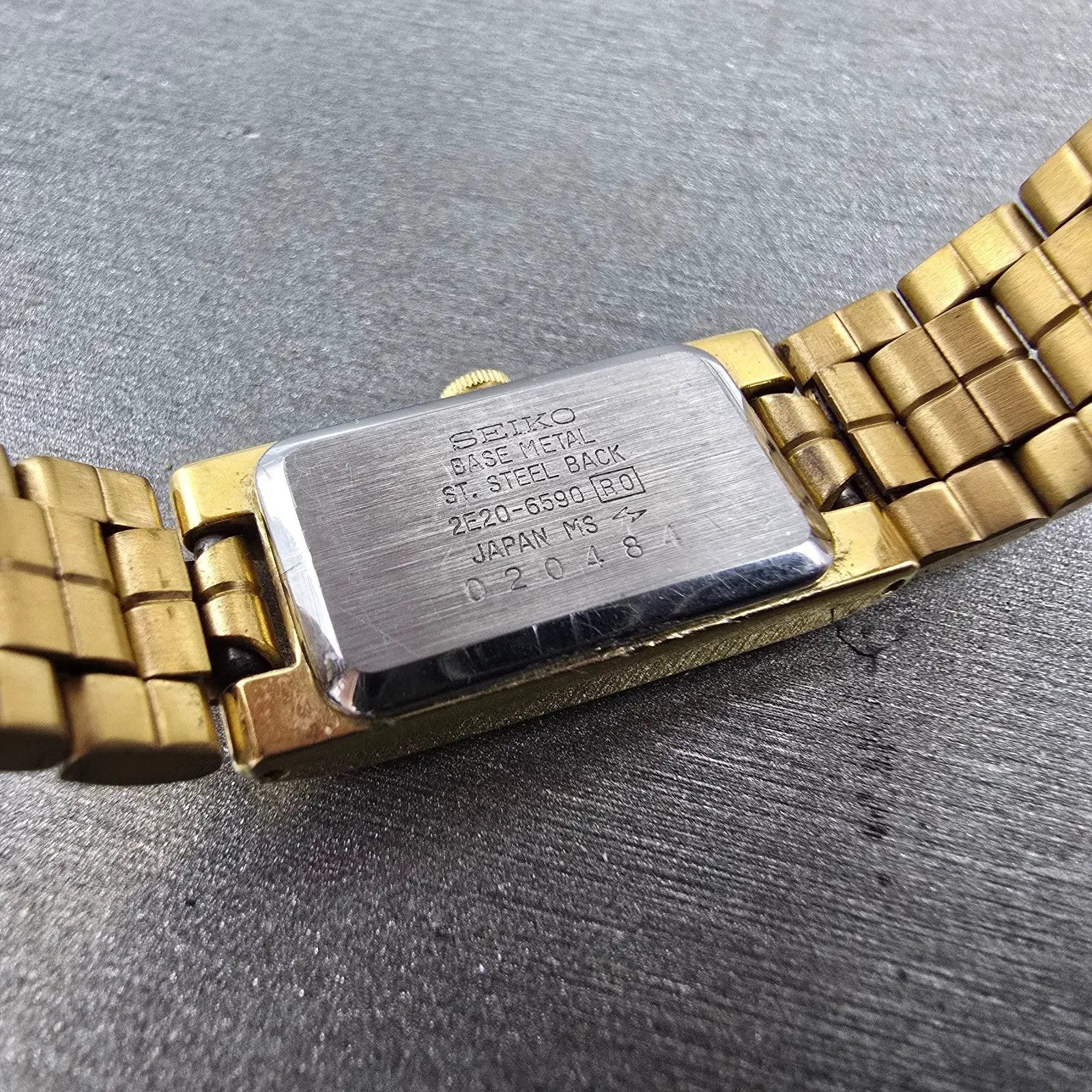 Seiko Tank Watch Women 13mm Champagne Dial Gold Tone 2E20-6590 New Battery VTG J9
