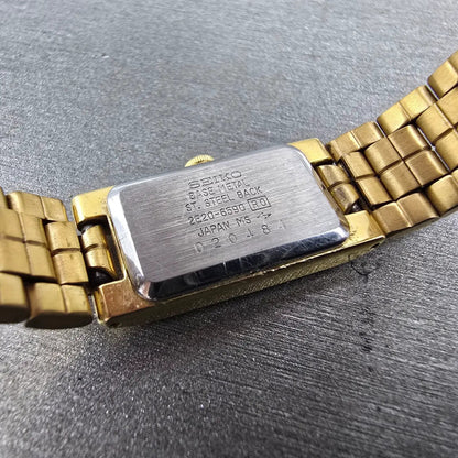 Seiko Tank Watch Women 13mm Champagne Dial Gold Tone 2E20-6590 New Battery VTG J9