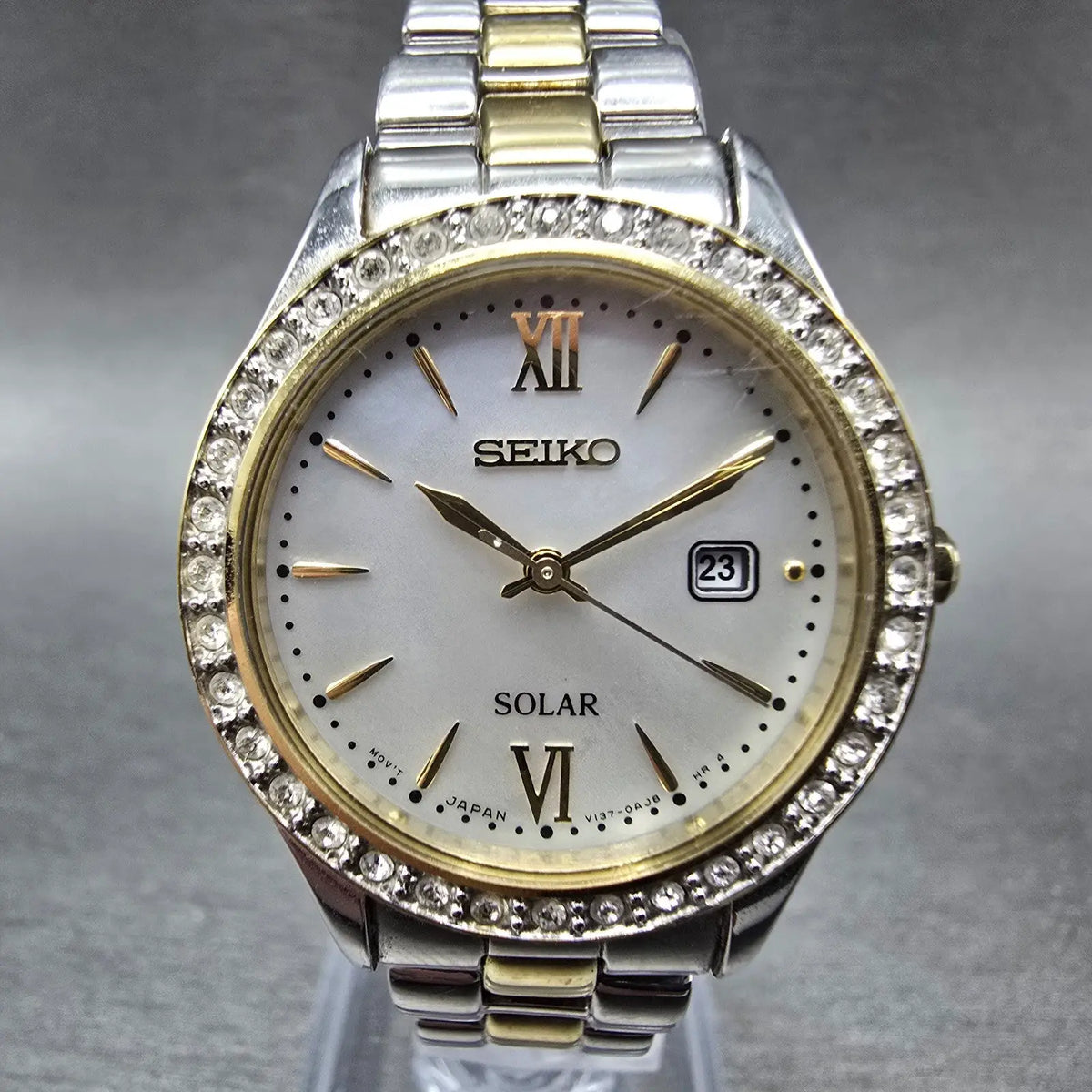 Seiko Solar Watch Women 28mm MOP Dial Two Tone Date Gemmed V137-0AA0 Works JP 950