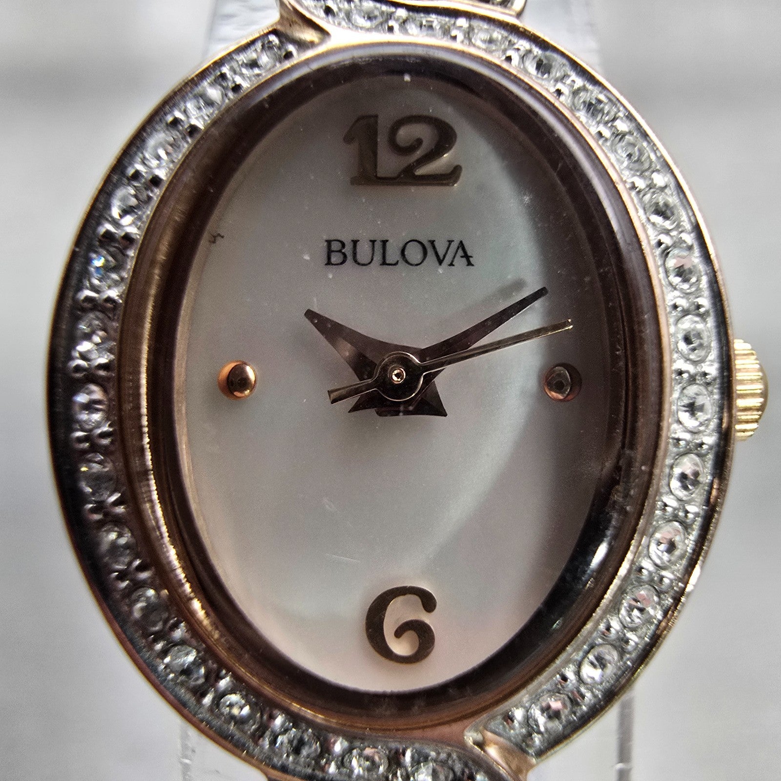 Bulova Watch Women 17mm MOP Dial Rose Gold Tone Gemmed Oval 98L200 New Battery1