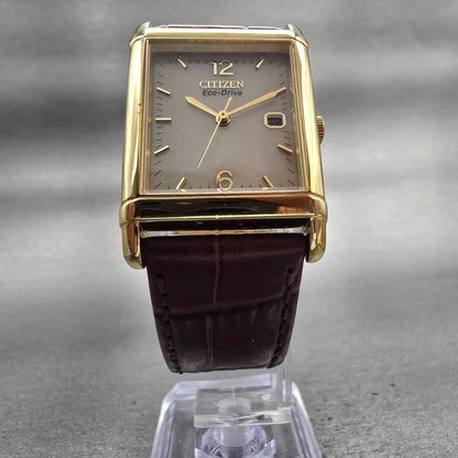 Citizen Eco-Drive Tank Watch Men 25mm Ivory Dial Gold Date E010-S001579 Works5