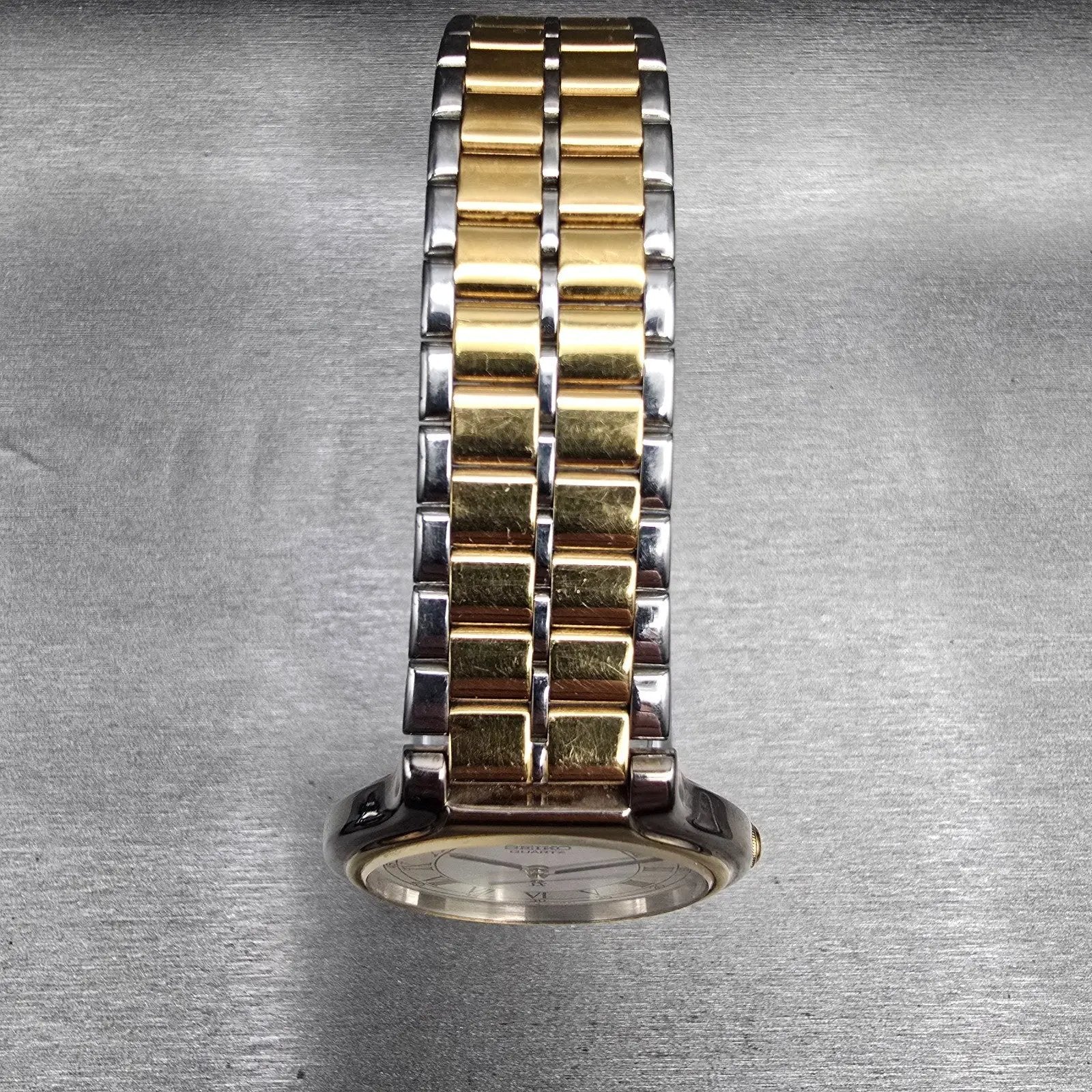 Seiko SX Watch Men 34mm White Dial Two Tone Round V701-6J60 New Battery VintageL4