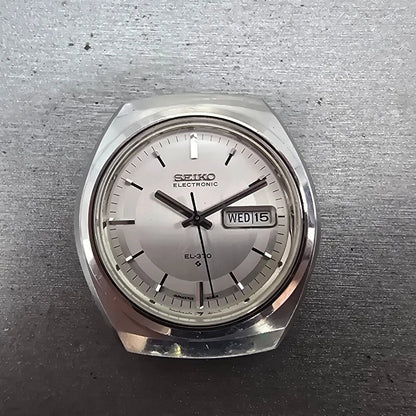 Seiko Electronic EL-370 Watch Men 39mm Silver Dial Steel Daydate 3703-8020 PARTS0