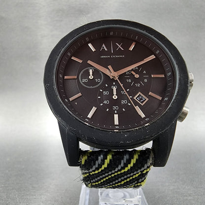 Armani Exchange black analog watch with chronograph, nylon strap, and date display