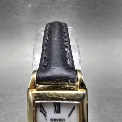 Seiko Solar Tank Watch Women 15mm White Dial Gold Tone Rectangle V116-0AA0 Works4