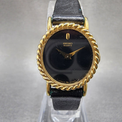 Seiko Watch Women 20mm Black Dial Gold Tone Oval 165199 New Battery0
