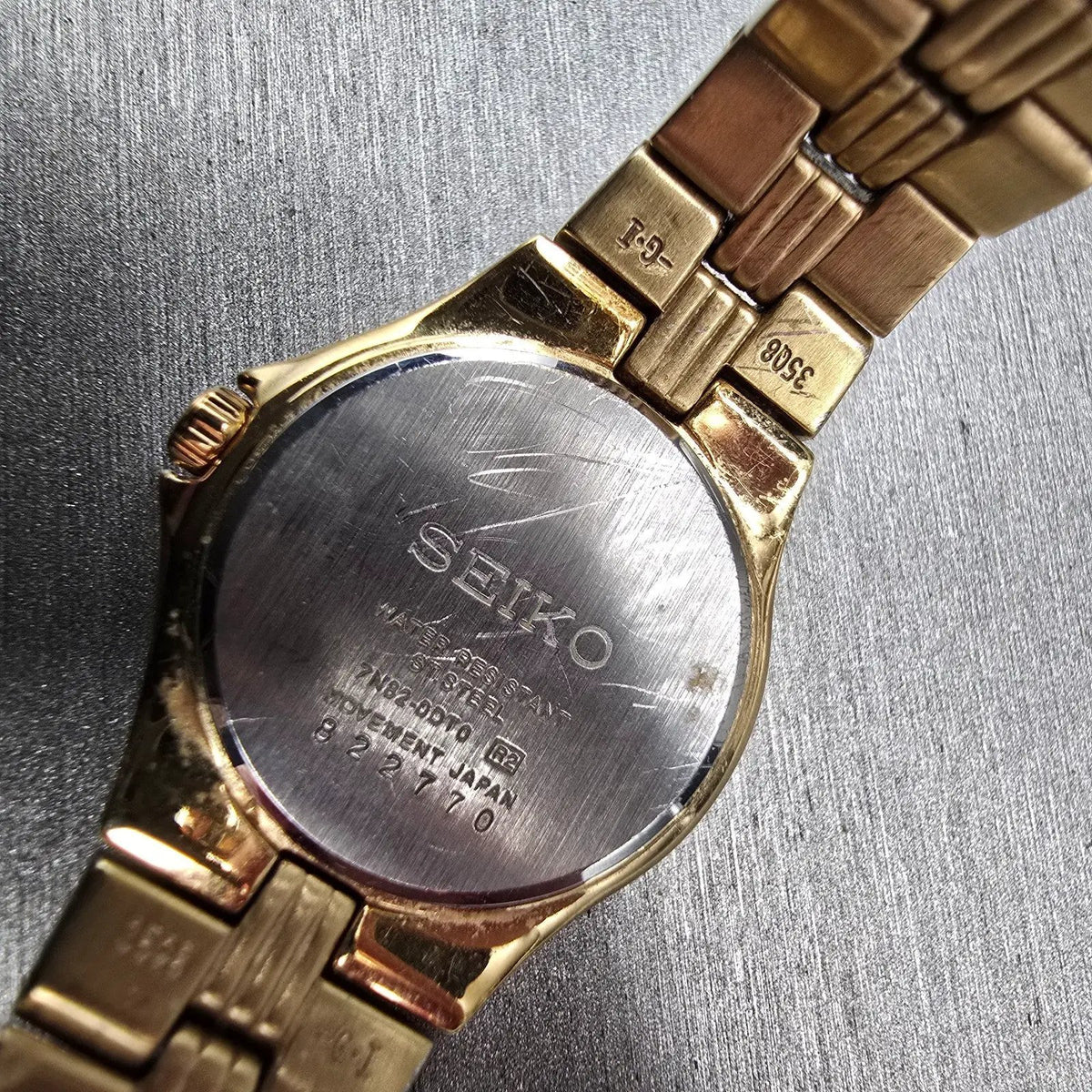 Seiko Watch Women 25mm Black Dial Gold Tone Date Diamonds 7N82-0DT0 New Battery10