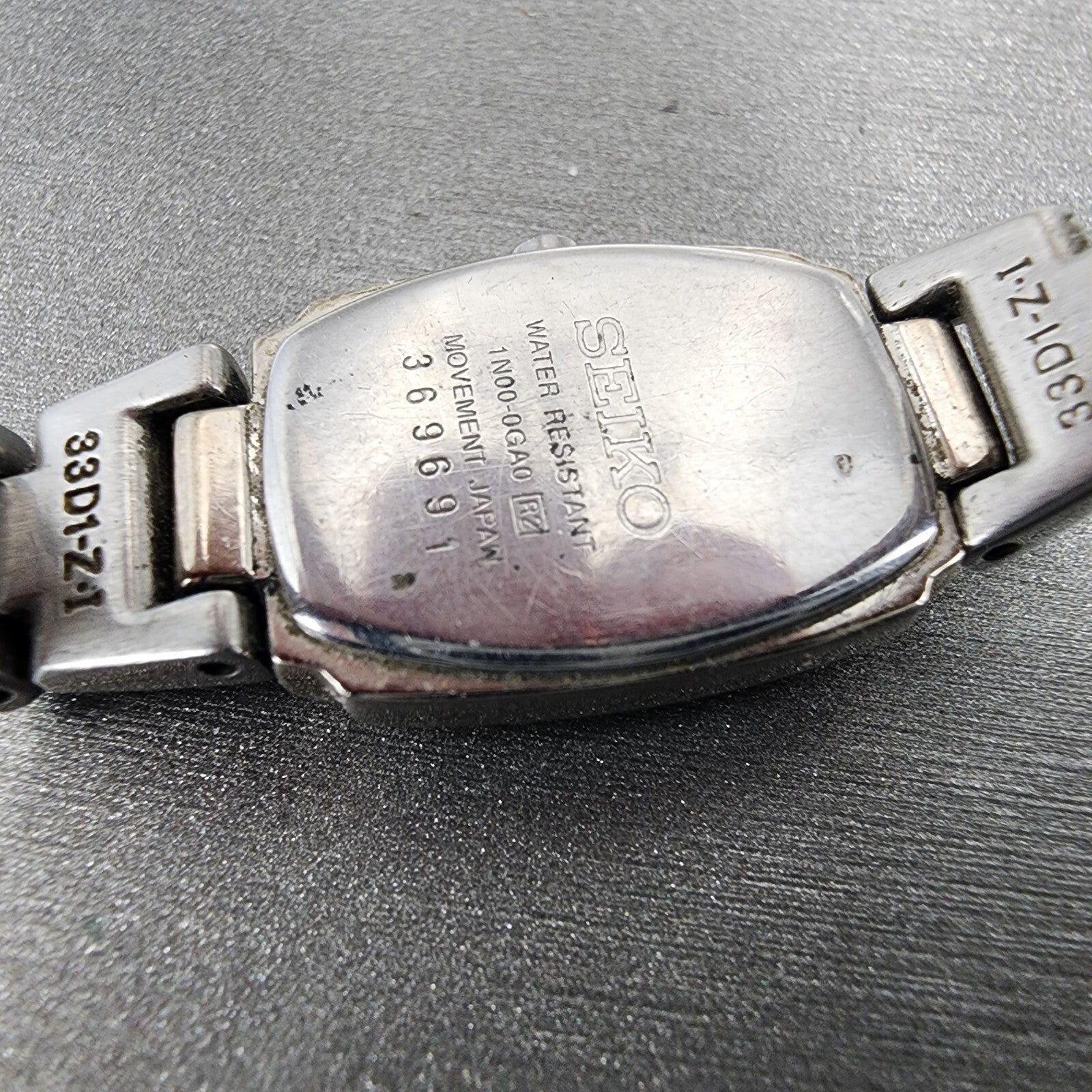 VTG Seiko Watch Women 16mm Blue Dial Silver Tone Rectangle 1N000GA0 New Battery9