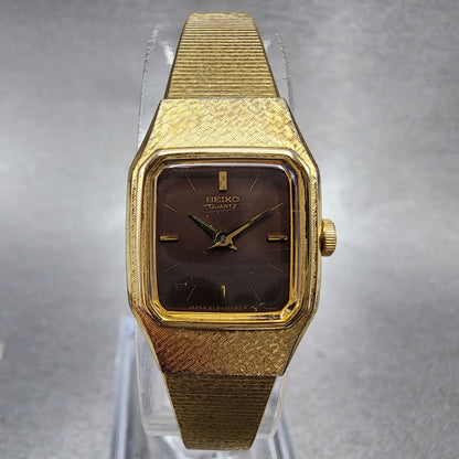 VTG Seiko Watch Women 16mm Black Dial Gold Tone Rectangle 2C205770 New Battery0