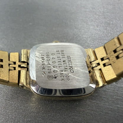 Seiko Watch Women 19mm Champagne Dial Gold Tone Rectangle 1400-6129 New Battery9