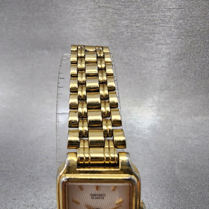 Seiko Tank Watch Women 18mm White Dial Gold Tone Rectangle V4015129 New Battery4