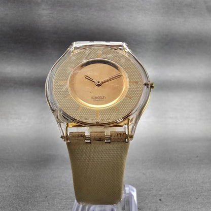 Swatch Skin THINE Watch Women Gold Dial Clear Case Round SFK155 New Battery5