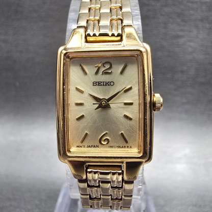 Seiko Tank Watch Women 17mm Champagne Dial Gold Tone Rectangle 1N01-0FH0 NewBatH0