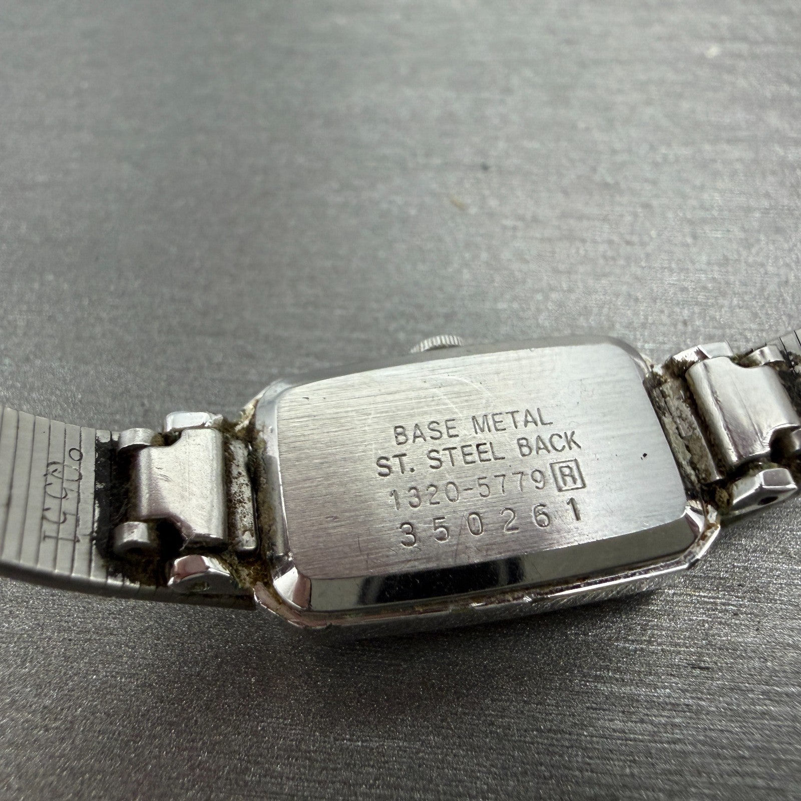 Seiko Watch Women 13mm Silver Dial Silver Tone Rectangle 1320-5779 New Battery79