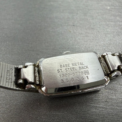 Seiko Watch Women 13mm Silver Dial Silver Tone Rectangle 1320-5779 New Battery79