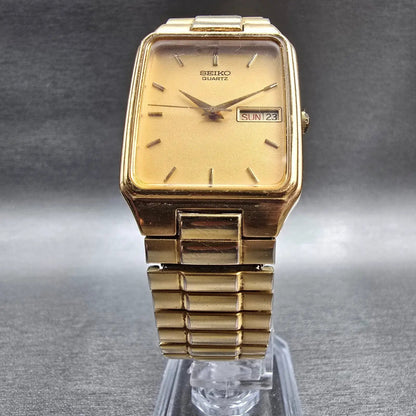 Seiko Watch Men 28mm Gold Dial Gold Tone Daydate Rectangle 7N33-5028 New Batt JP5