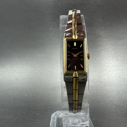 Seiko Tank Watch Women 13mm Black Dial Two Tone Rectangle 2e20-7479 New BatteryU5
