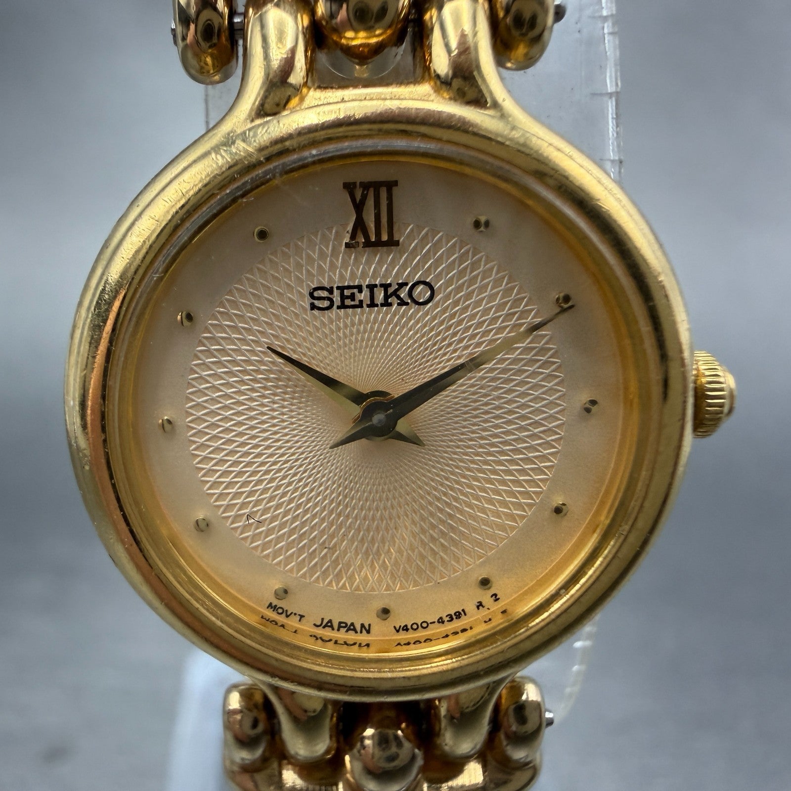 Seiko Watch Women 21mm Champagne Dial Gold Tone Round V400-1229 New Battery GVt1