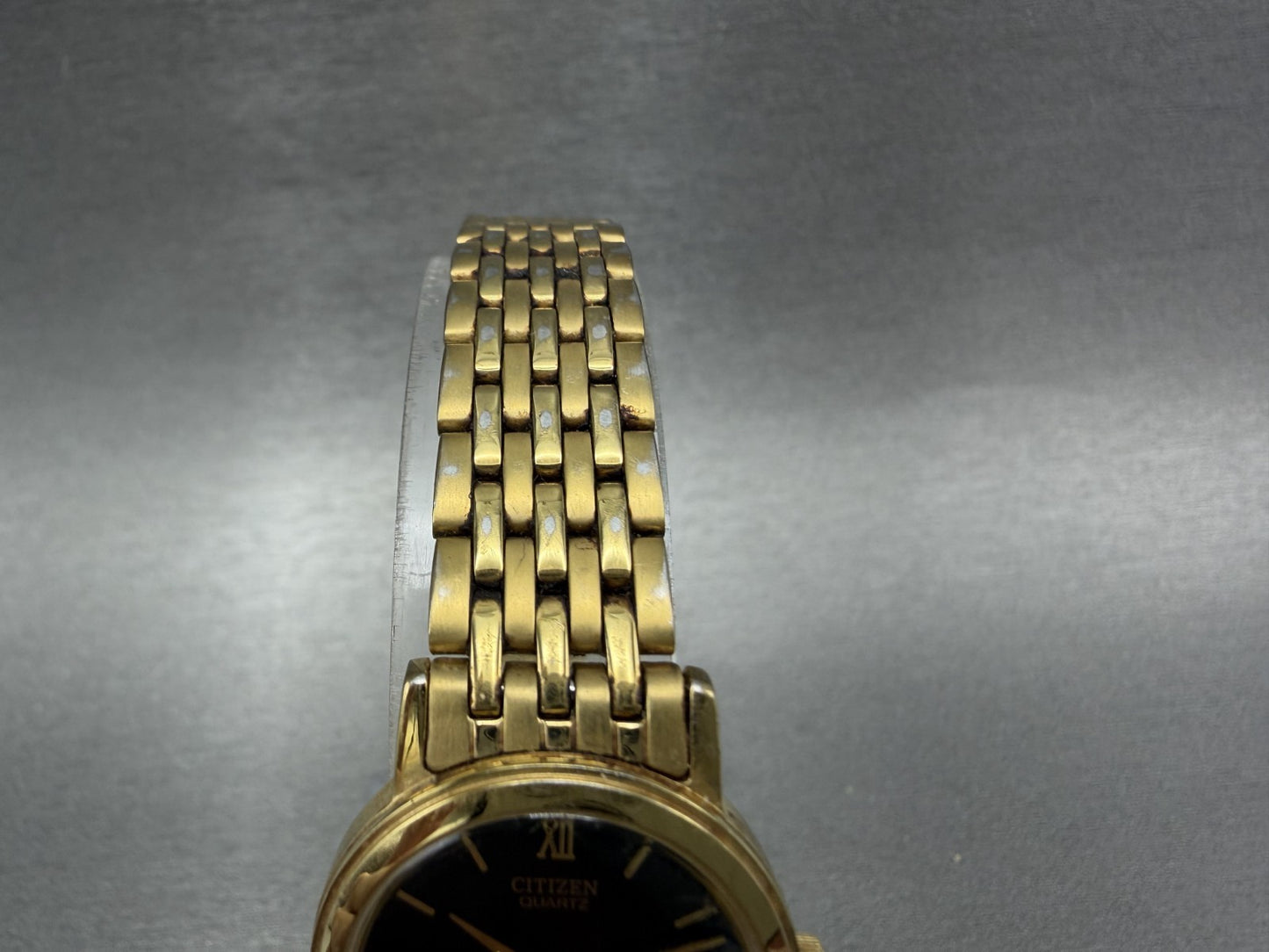 Citizen Watch Women 24mm Black Dial Gold Tone Date Round 1012S038562 New Batt7