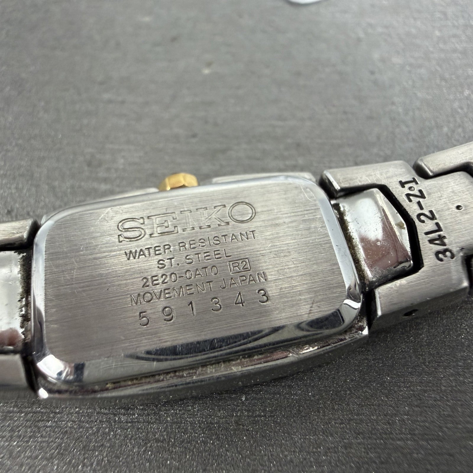 Seiko Watch Women 14mm Silver Dial Two Tone Rectangle 2e200at0 New Battery9