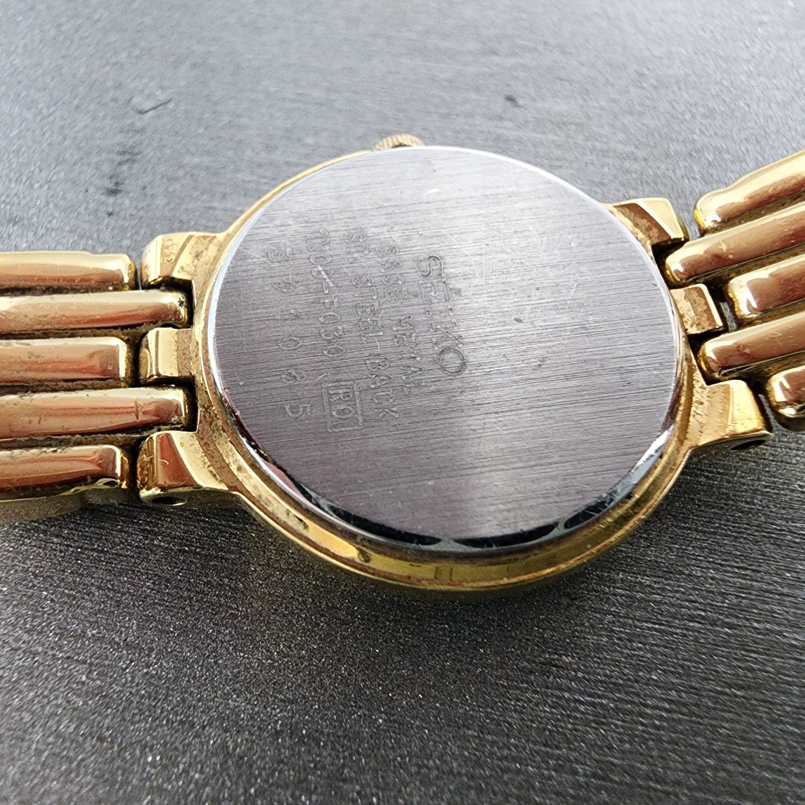 Seiko Watch Women 22mm Black Dial Gold Tone Round 1N00F030 New Battery9