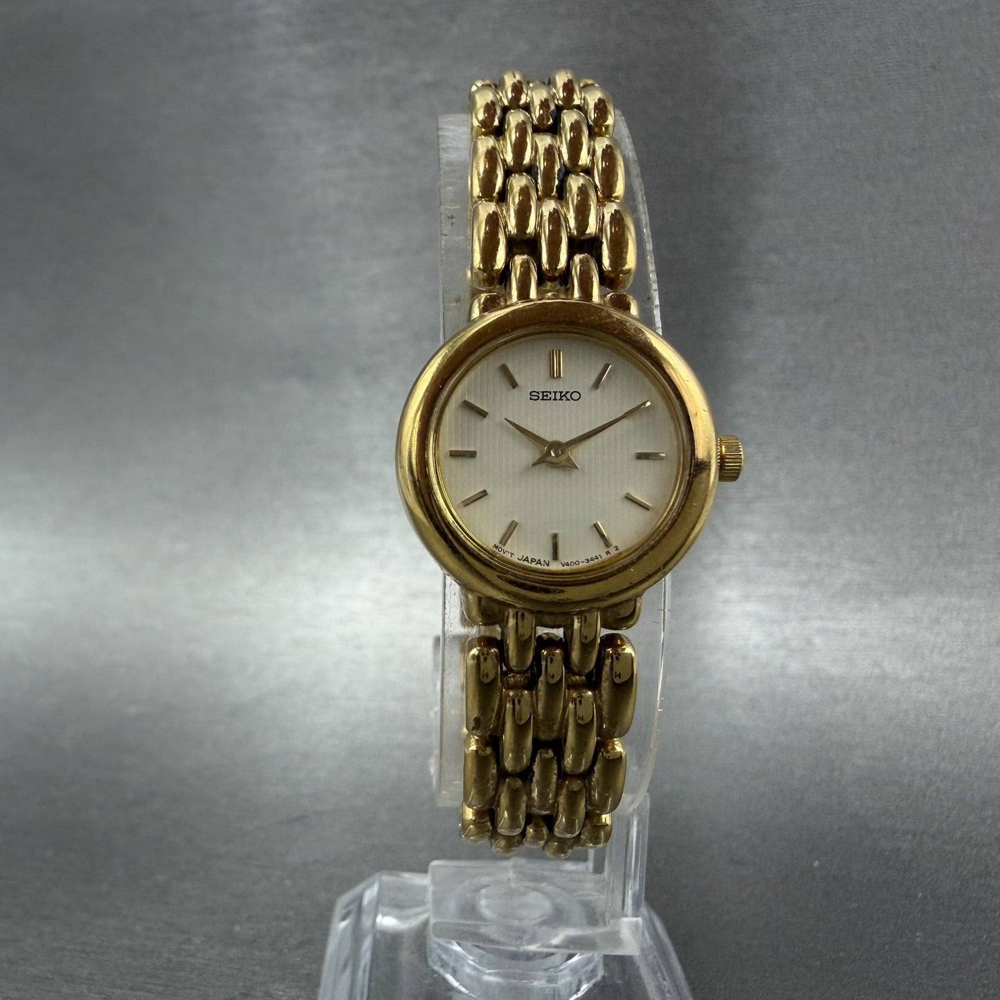 Seiko Watch Women 20mm White Dial Gold Tone Round V400-0990 New Battery ABC5