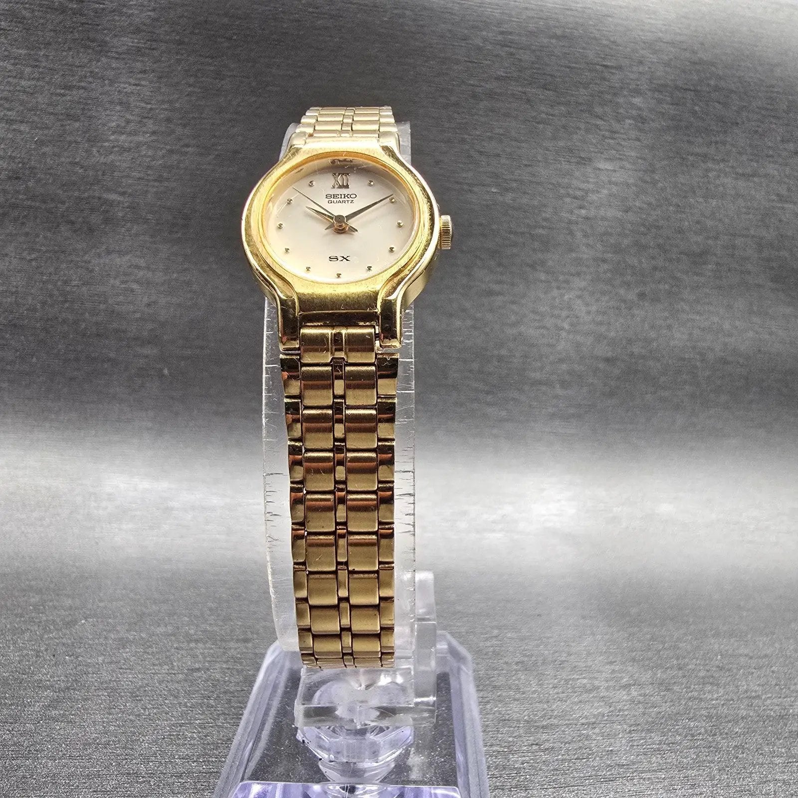 Seiko SX Watch Women 19mm Champagne Dial Gold Tone Round V401-0091 New Battery G5