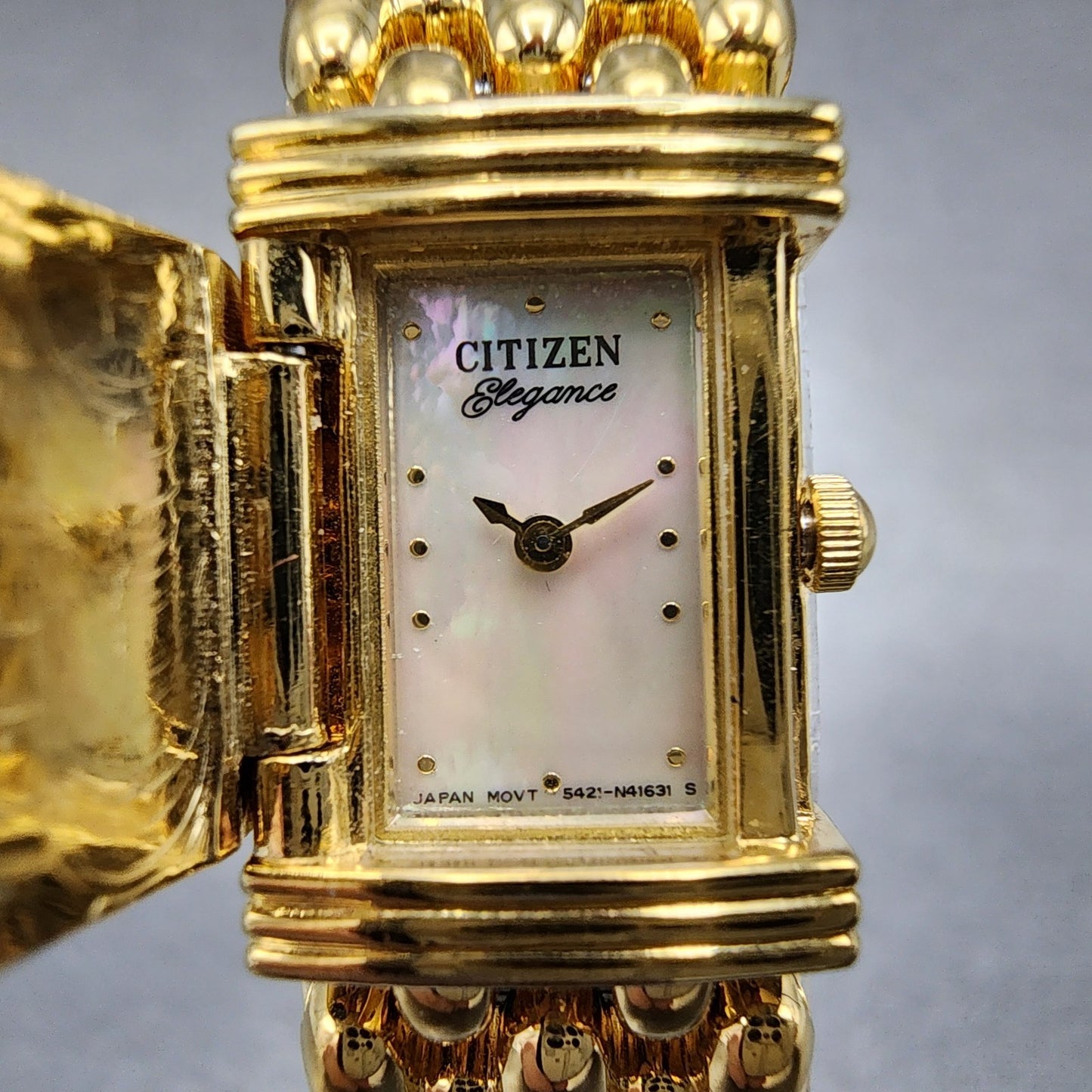 Citizen Elegance Tank Watch Women 15mm MOP Dial Gold Tone Hide Away New Batt B121