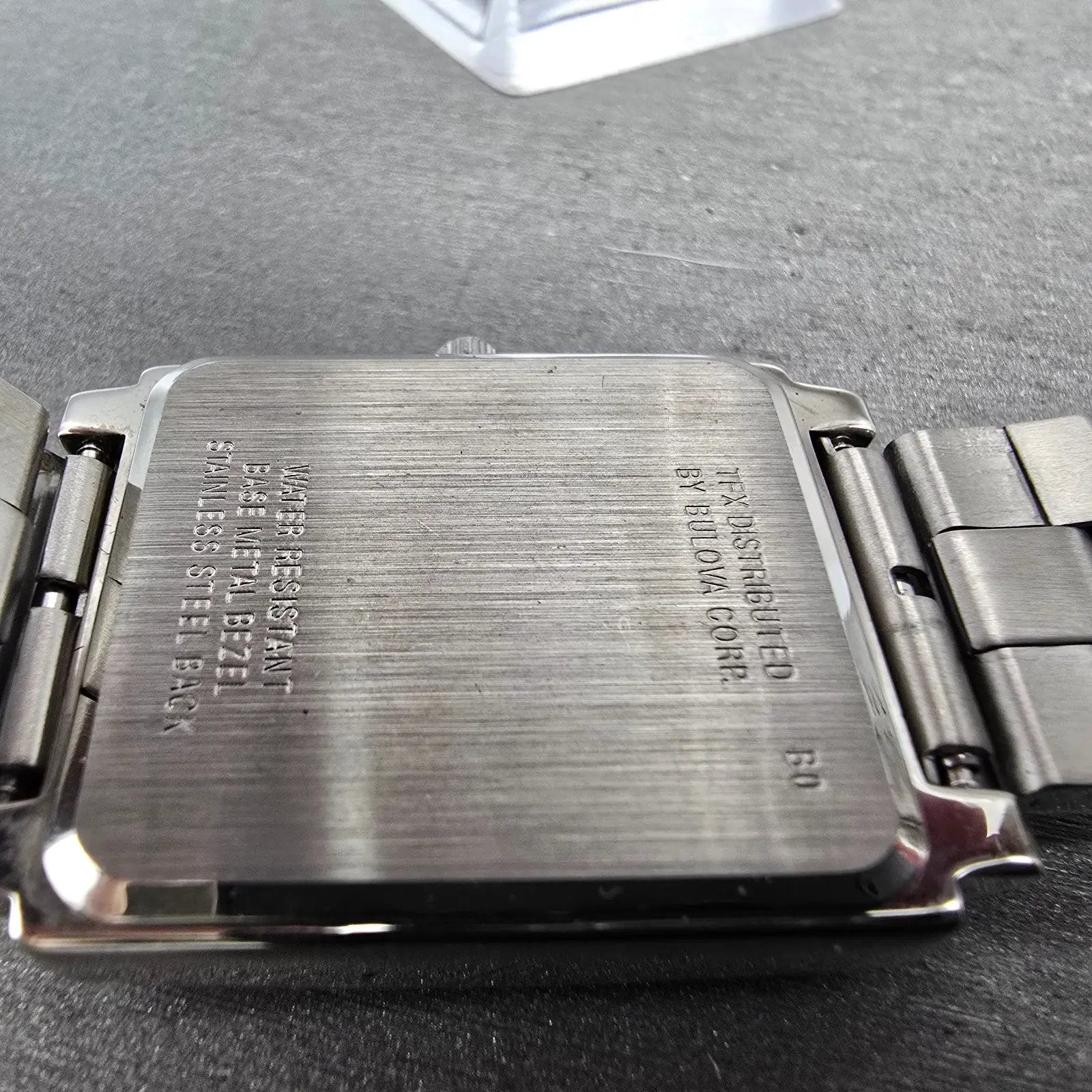 Bulova TFX Tank Watch Men 29mm Silver Dial Silver Tone date 36B05 New Battery9