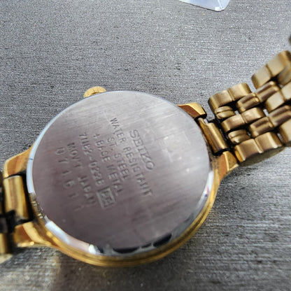 Seiko Watch Women 23mm White Dial Gold Tone Date Round 7N820228 New Battery B129