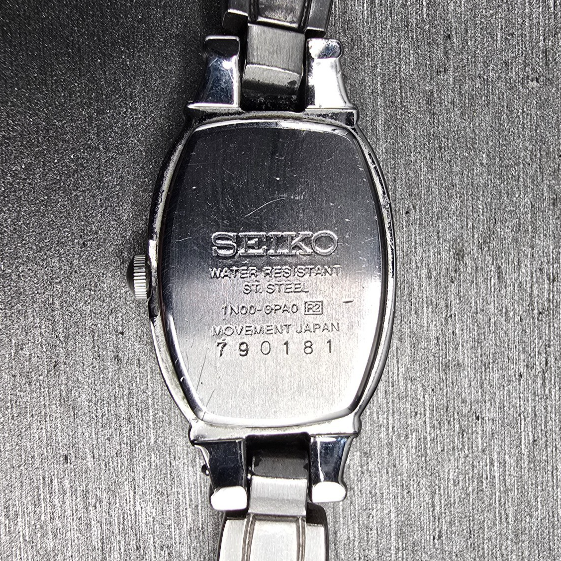Seiko Watch Women 16mm Silver Dial Silver Tone Rectangle 1N00-0PA0 New Battery10