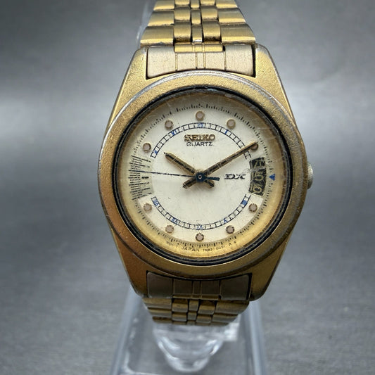 Seiko DX Watch Women 24mm Champagne Dial Gold Tone Date 7N82-0191 New Battery0