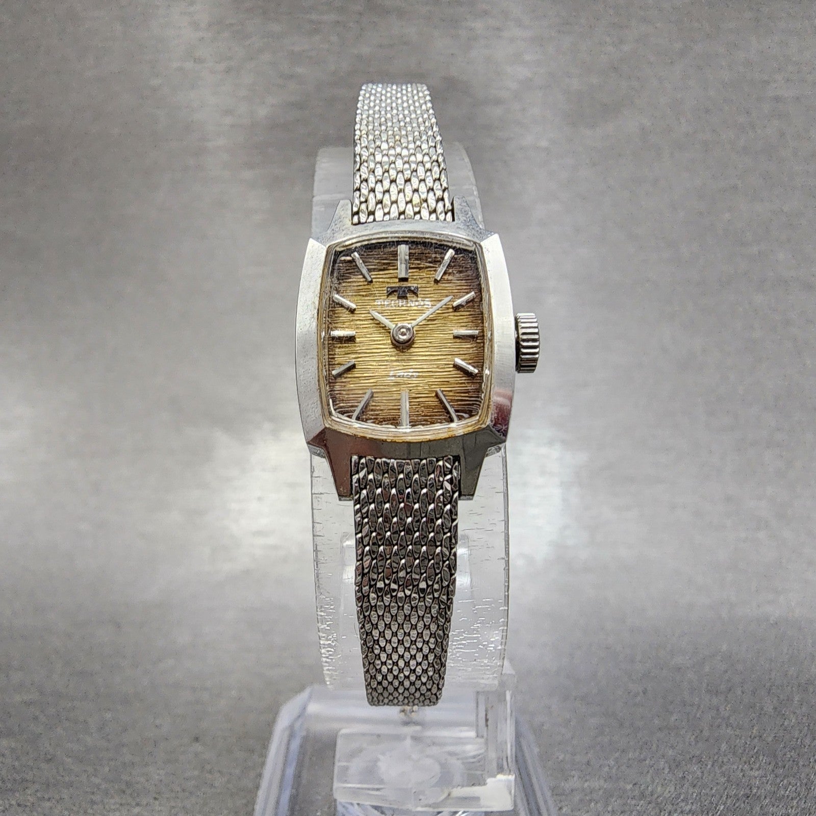 Technos Tank Watch Women 16mm Gold Dial Silver Tone Rectangle Manual Wind Runs5