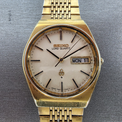 Seiko Lord quartz Watch Men 34mm Cream Dial Gold Tone Daydate 78537010 PARTS2