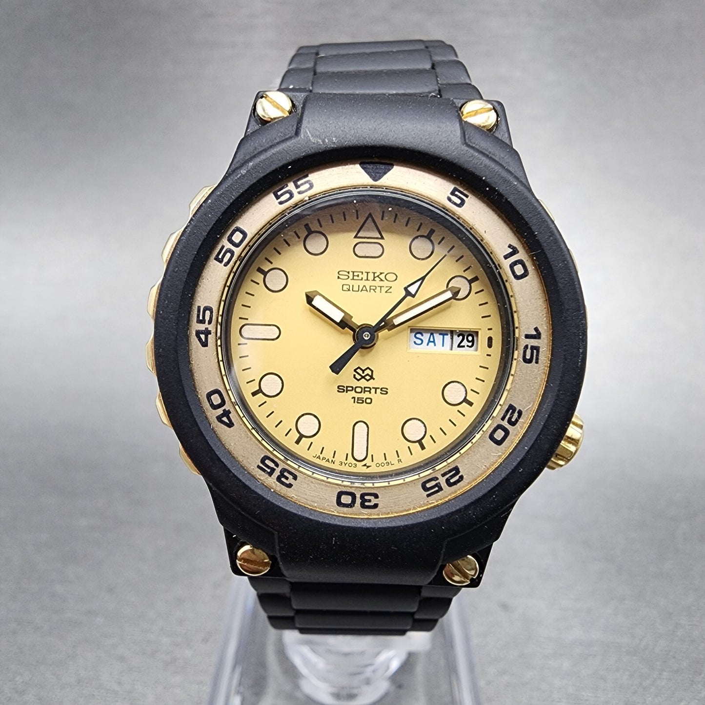 Seiko Sports 150 Watch Women 29mm Gold Dial Black Tone Daydate Round New Batt0