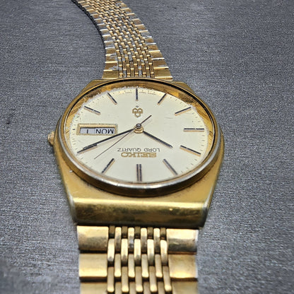 Seiko Lord quartz Watch Men 34mm Cream Dial Gold Tone Daydate 78537010 PARTS5